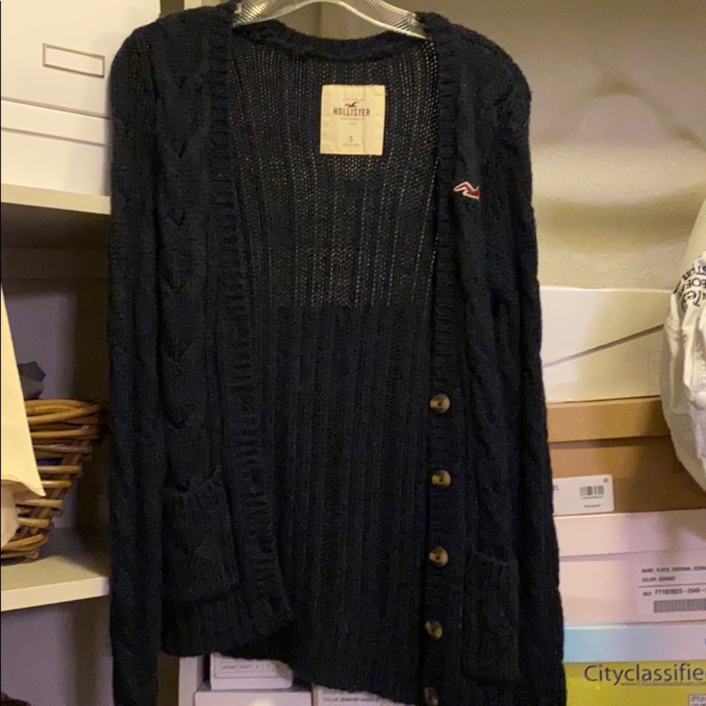 Navy blue cardigan.